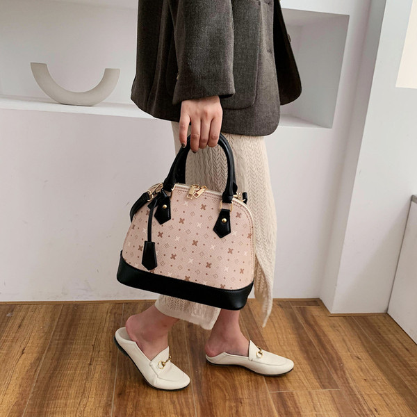 Modern női táska ökobőr cipzárral, két színben