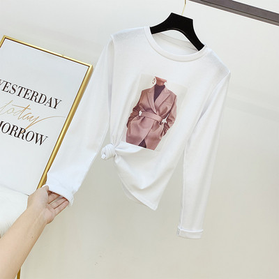 Γυναικεία μπλούζα με διακοσμητικά στοιχεία σε άσπρο και μαύρο χρώμα