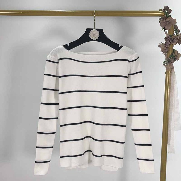 Γυναικεία ριγέ μπλούζα σε λευκό, γκρι και μαύρο χρώμα