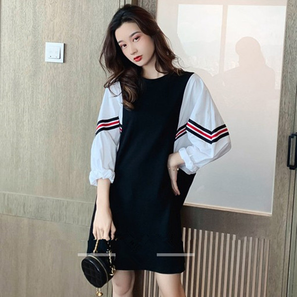 Női alkalmi ruha fekete színben, széles ujjal