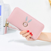 Geanta de dama cu elemente metalice si ciucuri