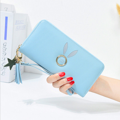 Geanta de dama cu elemente metalice si ciucuri