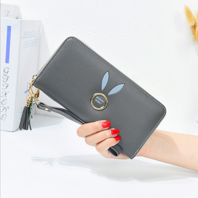 Geanta de dama cu elemente metalice si ciucuri