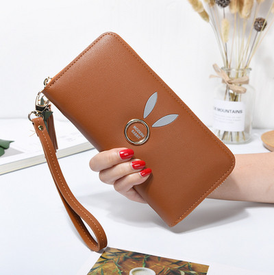 Geanta de dama cu elemente metalice si ciucuri