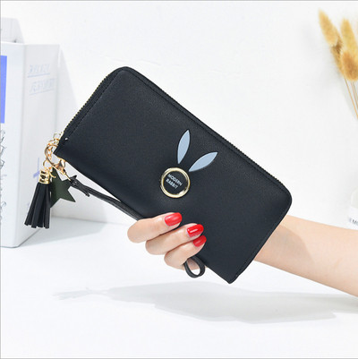 Geanta de dama cu elemente metalice si ciucuri