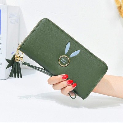 Geanta de dama cu elemente metalice si ciucuri