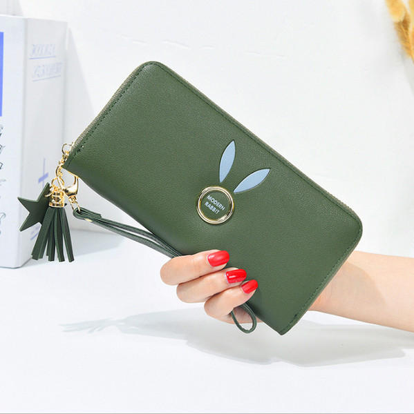 Geanta de dama cu elemente metalice si ciucuri