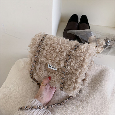 Γυναικεία τσάντα μεμεταλλικό κουμπιά σε διάφορα χρώματα