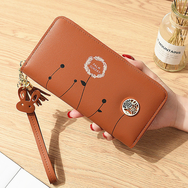 Geanta de dama cu aplicatii si elemente metalice