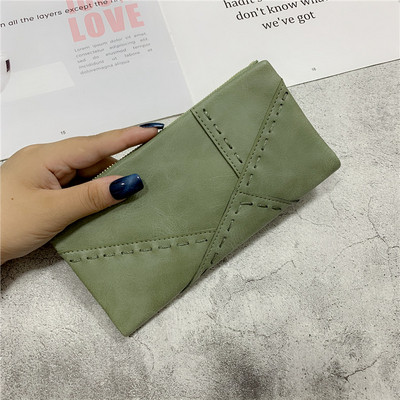 Μοντέρνο γυναικείο πορτοφόλι σε μαύρο, πράσινο και μπλε χρώμα