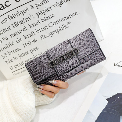 Geanta de dama din piele ecologica reliefata cu element metalic in culorile gri, verde, rosu si negru