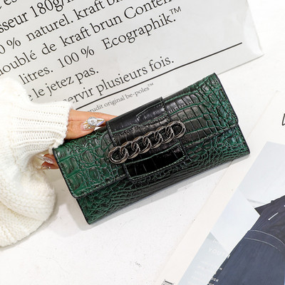 Geanta de dama din piele ecologica reliefata cu element metalic in culorile gri, verde, rosu si negru