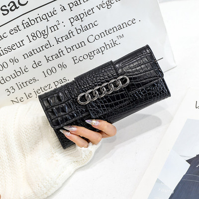 Geanta de dama din piele ecologica reliefata cu element metalic in culorile gri, verde, rosu si negru