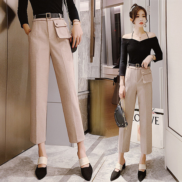 Modern női nadrág magas derékkal és övvel