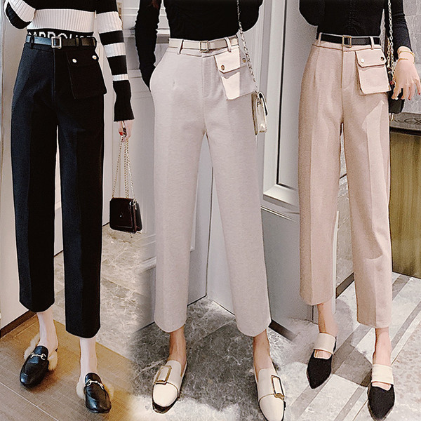 Modern női nadrág magas derékkal és övvel