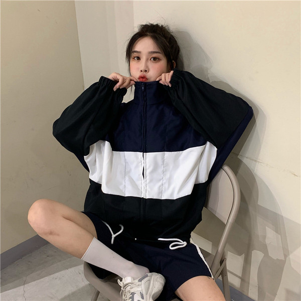 Γυναικείο φαρδύ πουλόβερ με φερμουάρ 