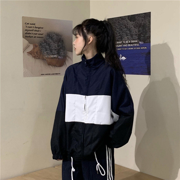 Γυναικείο φαρδύ πουλόβερ με φερμουάρ 