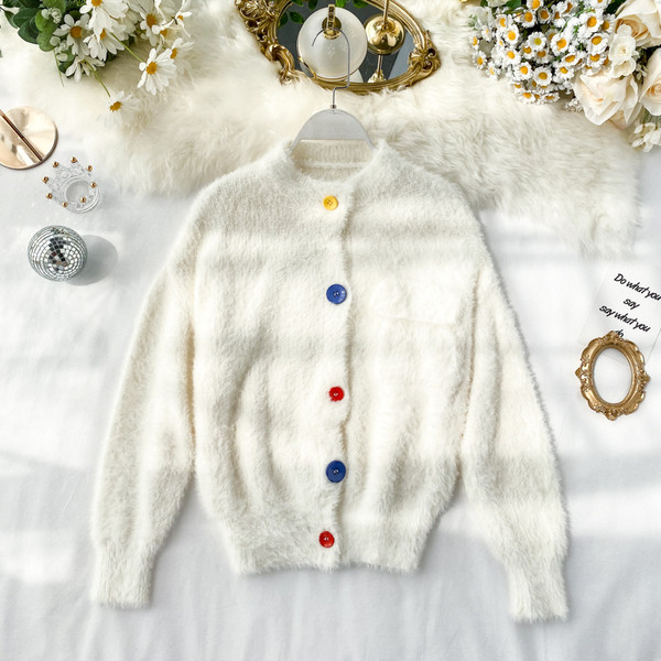 Vesta moderna de puf de dama cu nasturi colorati in trei culori