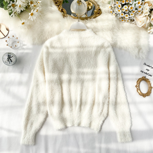 Vesta moderna de puf de dama cu nasturi colorati in trei culori