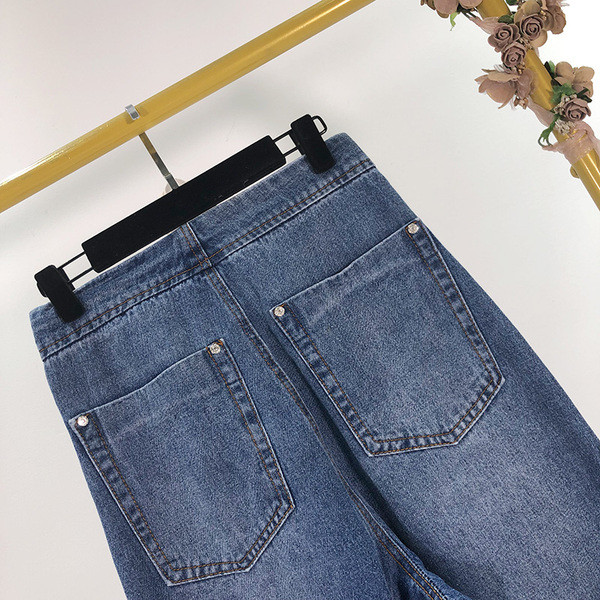 Kék színű gombos női farmer - széles modell