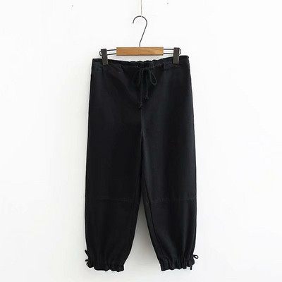 Divatos női nadrág barna és fekete nyakkendővel