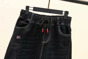 Μοντέρνα γυναικεία φούστα denim  με τσέπη σε μαύρο χρώμα