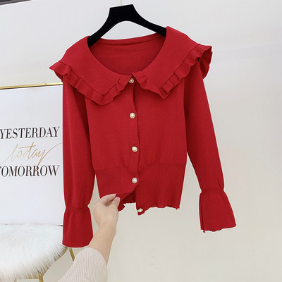 Női pulóver gombokkal és gallérral több színben