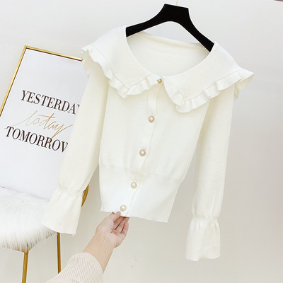 Női pulóver gombokkal és gallérral több színben