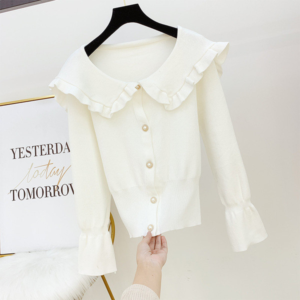 Női pulóver gombokkal és gallérral több színben