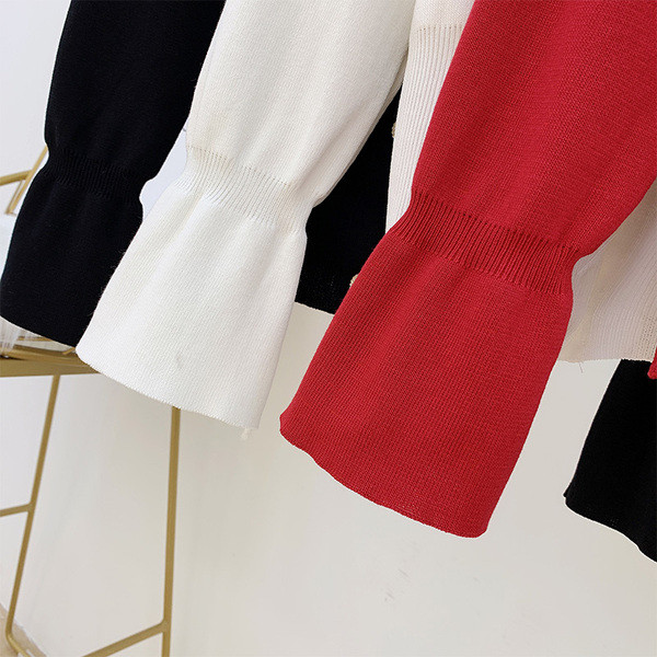 Női pulóver gombokkal és gallérral több színben