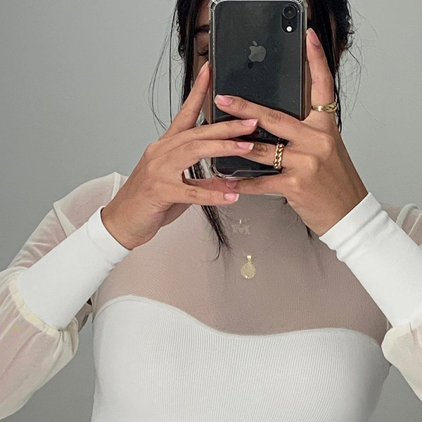 Női alkalmi fehér blúz pólógallérral és hosszú ujjal