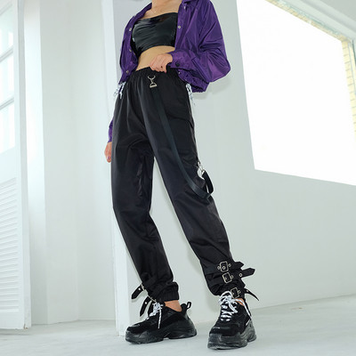 Stílusos női nadrág fekete és bézs színben, magas derékkal