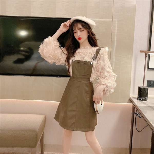 Γυναικεία  σύγχρονη φαρδιά μπλούζα με κρόσσια σε δύο χρώματα