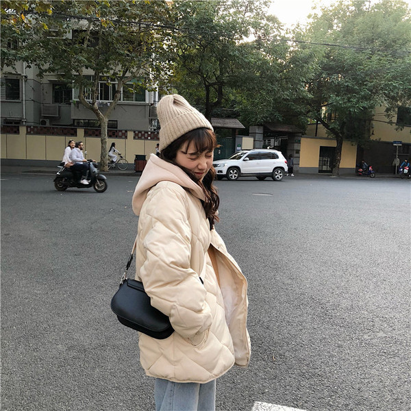 Γυναικείο μπουφάν σε δύο χρώματα με κουκούλα - φαρδύ μοντέλο 