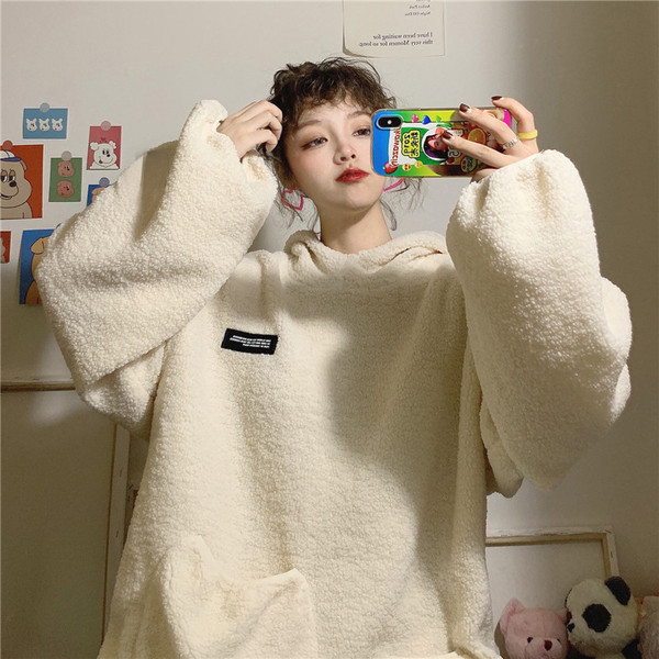 Γυναικείο  χνουδωτό φούτερ με τσέπες και κουκούλα σε δύο χρώματα