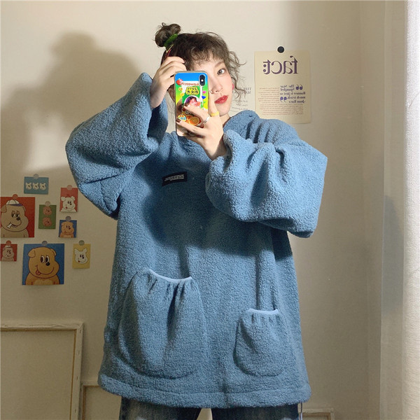 Γυναικείο  χνουδωτό φούτερ με τσέπες και κουκούλα σε δύο χρώματα