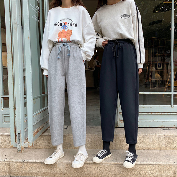 Γυναικείο αθλητικό παντελόνι σε γκρι και μαύρο χρώμα με ελαστική μέση