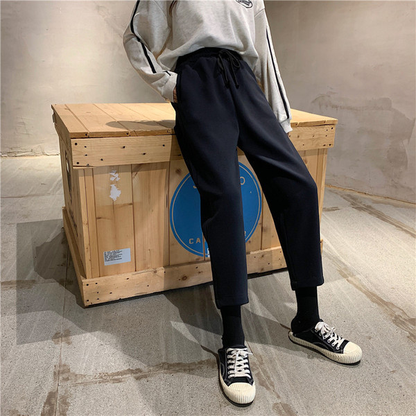 Γυναικείο αθλητικό παντελόνι σε γκρι και μαύρο χρώμα με ελαστική μέση