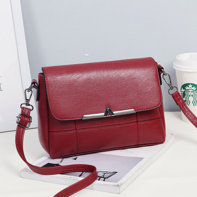 Alkalmi női táska fekete, lila, szürke, rózsaszín és piros színben