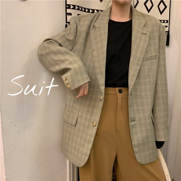 Дамско модерно карирано сако широк модел