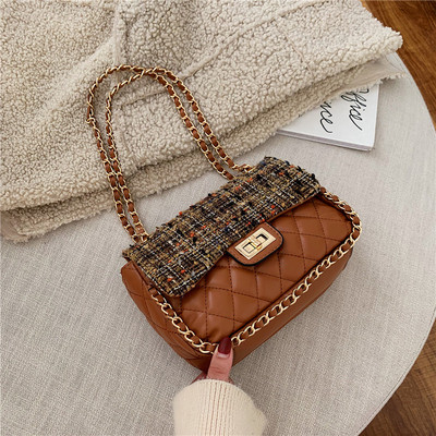 Γυναικεία τσάντα με μεταλλικό συνδετήρα σε τρία χρώματα