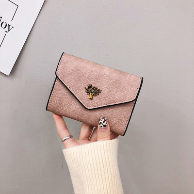 Γυναικείο πορτοφόλι γυναικείο με μεταλλικό στοιχείο σε μαύρο, ροζ, κόκκινο και ασημί χρώμα