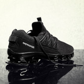 Μοντέρνα αθλητικά ανδρικά παπούτσια σε μαύρο, γκρι και κόκκινο χρώμα