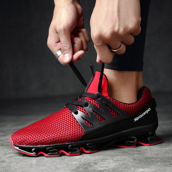 Μοντέρνα αθλητικά ανδρικά παπούτσια σε μαύρο, γκρι και κόκκινο χρώμα