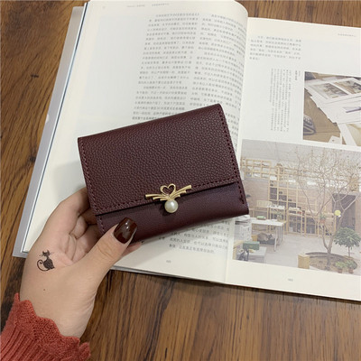 Geanta de dama moderna cu element metalic si perla