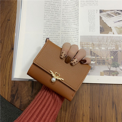 Geanta de dama moderna cu element metalic si perla