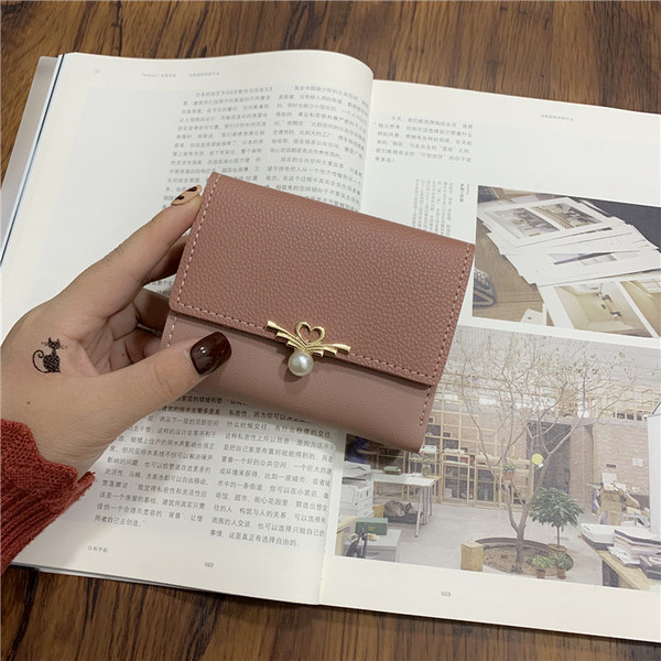 Geanta de dama moderna cu element metalic si perla