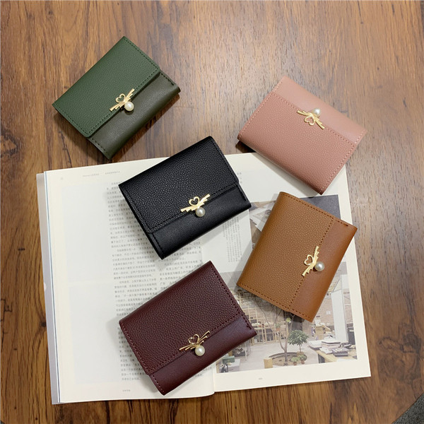 Geanta de dama moderna cu element metalic si perla