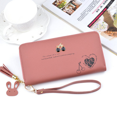 Γυναικείο πορτοφόλι με εφαρμογή και μεταλλικά στοιχεία