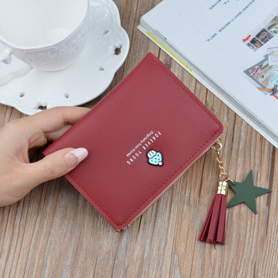 Poșetă de damă cu element metalic și inscripție